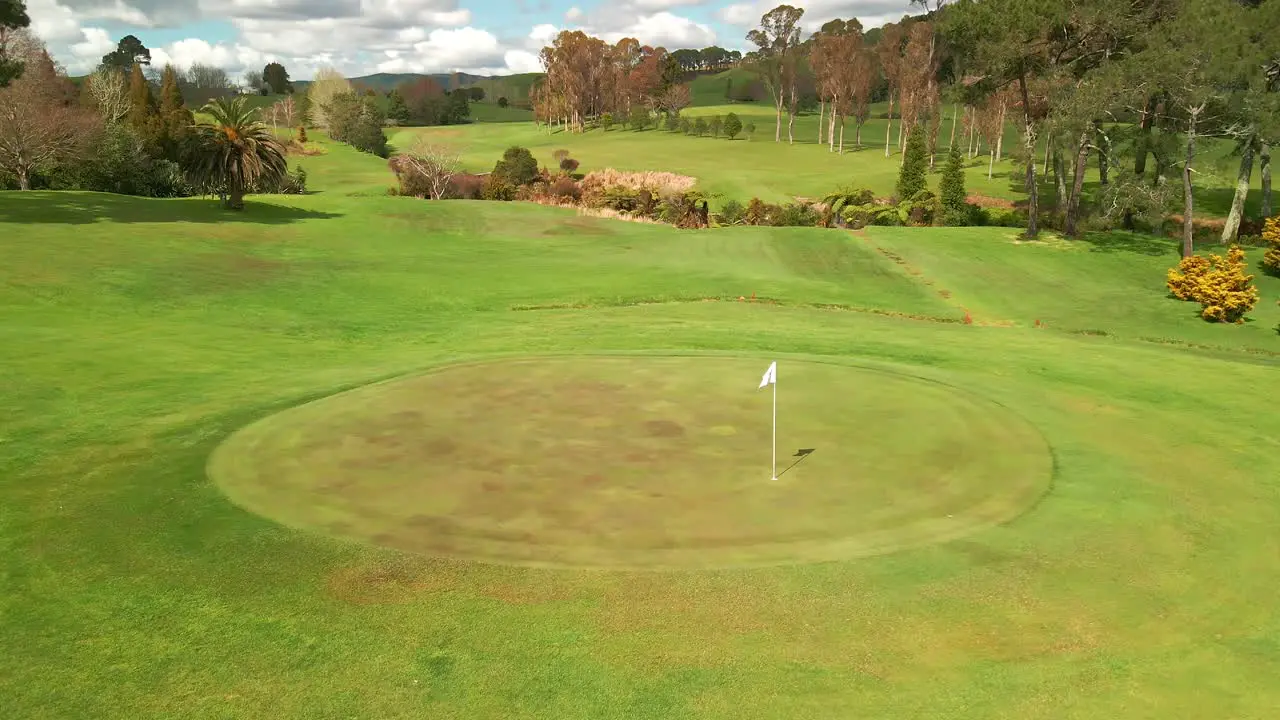 Drone video flying over golf course green