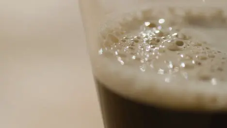 Close Up Of Pint Of Irish Stout In Glass To Celebrate St Patricks Day 1