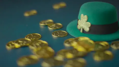 Studio Shot Of Green Leprechaun Top Hat And Piles Of Gold Coins To Celebrate St Patricks Day 6