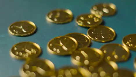 Close Up Studio Shot Of Gold Coins With Shamrock Symbol On Background To Celebrate St Patricks Day