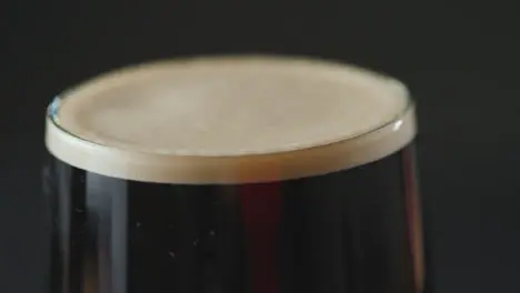 Close Up Of Pint Of Irish Stout In Glass To Celebrate St Patricks Day 6