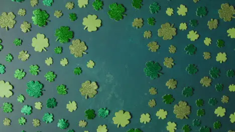 Overhead Studio Shot Of Green Shamrock Shapes With Copy Space To Celebrate St Patricks Day