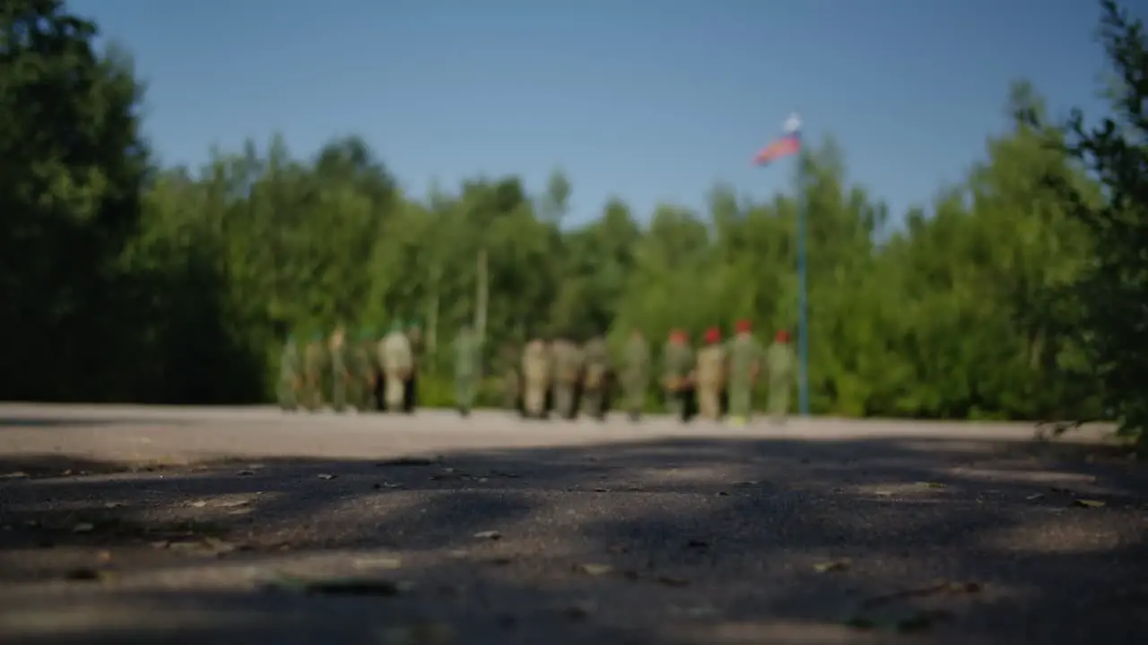 Soldiers in the forest formation in blurred vision marching