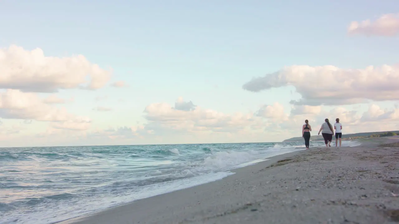 Women walking on the beach