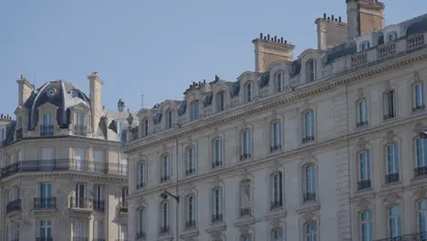 Close Up Of Apartment Blocks In Paris France Viewed From River Seine In Slow Motion