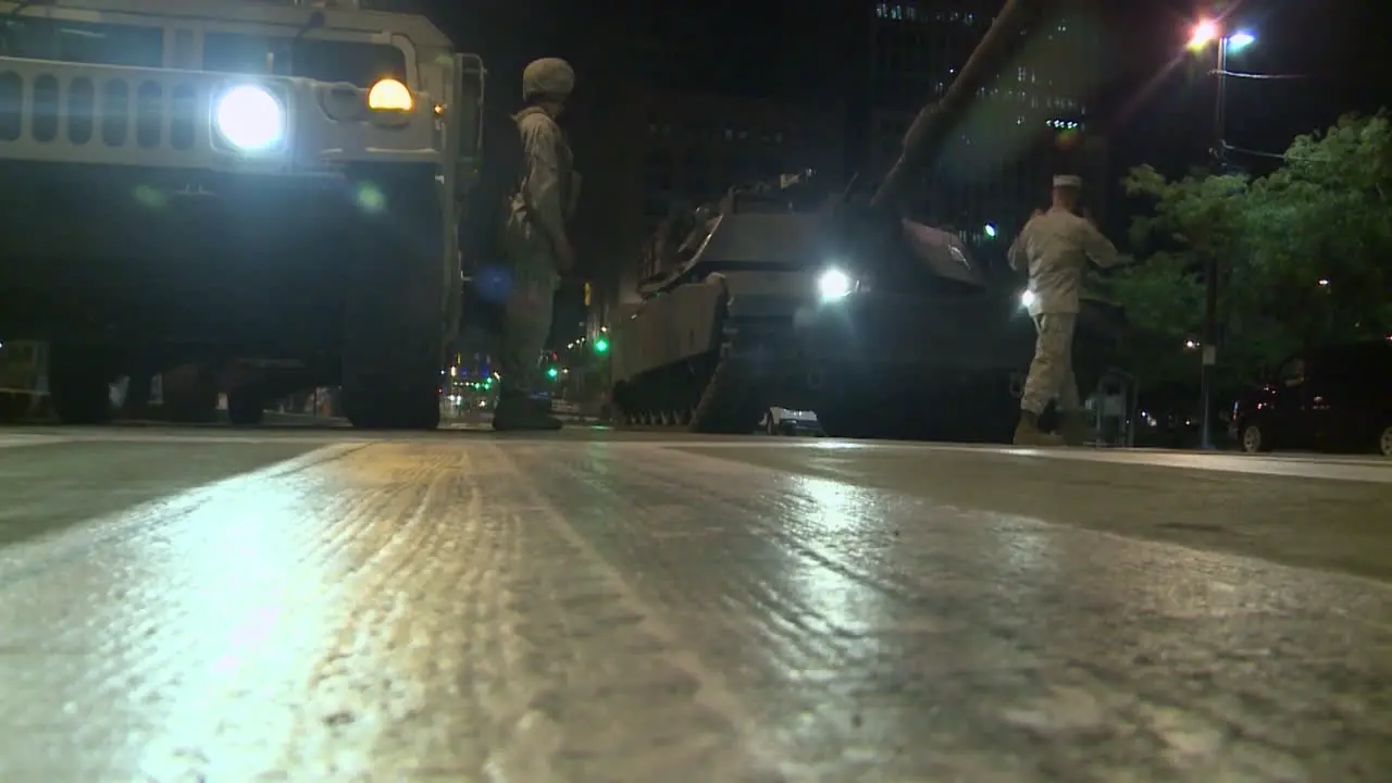 Police And Marines Roll Out Tanks And Armored Vehicles Through An American City During Times Of Public Unrest And Rioting 10