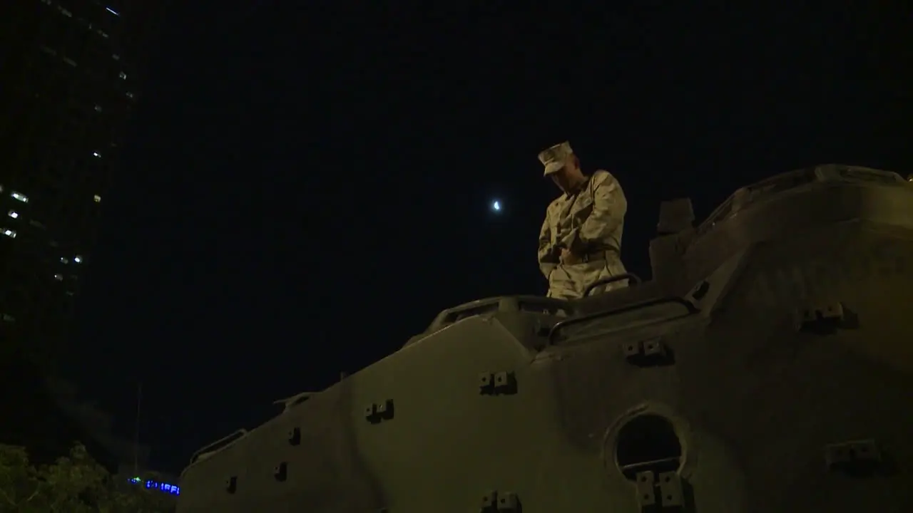 Police And Marines Roll Out Tanks And Armored Vehicles Through An American City During Times Of Public Unrest And Rioting 14