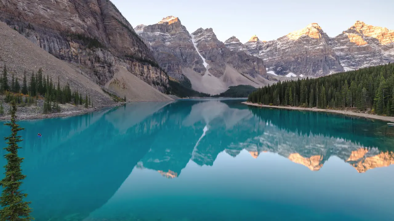 Sunrise time-lapse at clear pristine alpine lake in the Canadian Rockies