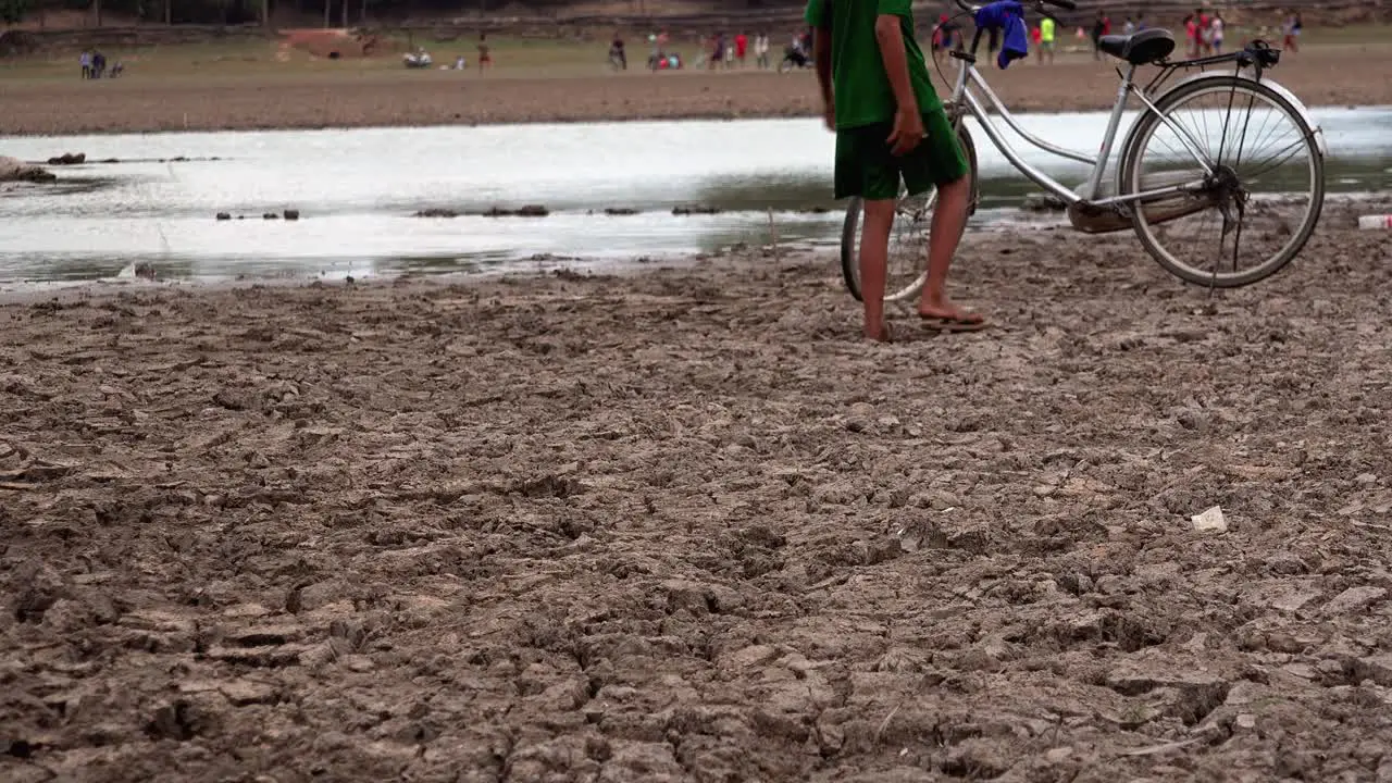 Close Shot of Asian Family Playing Near the Lake