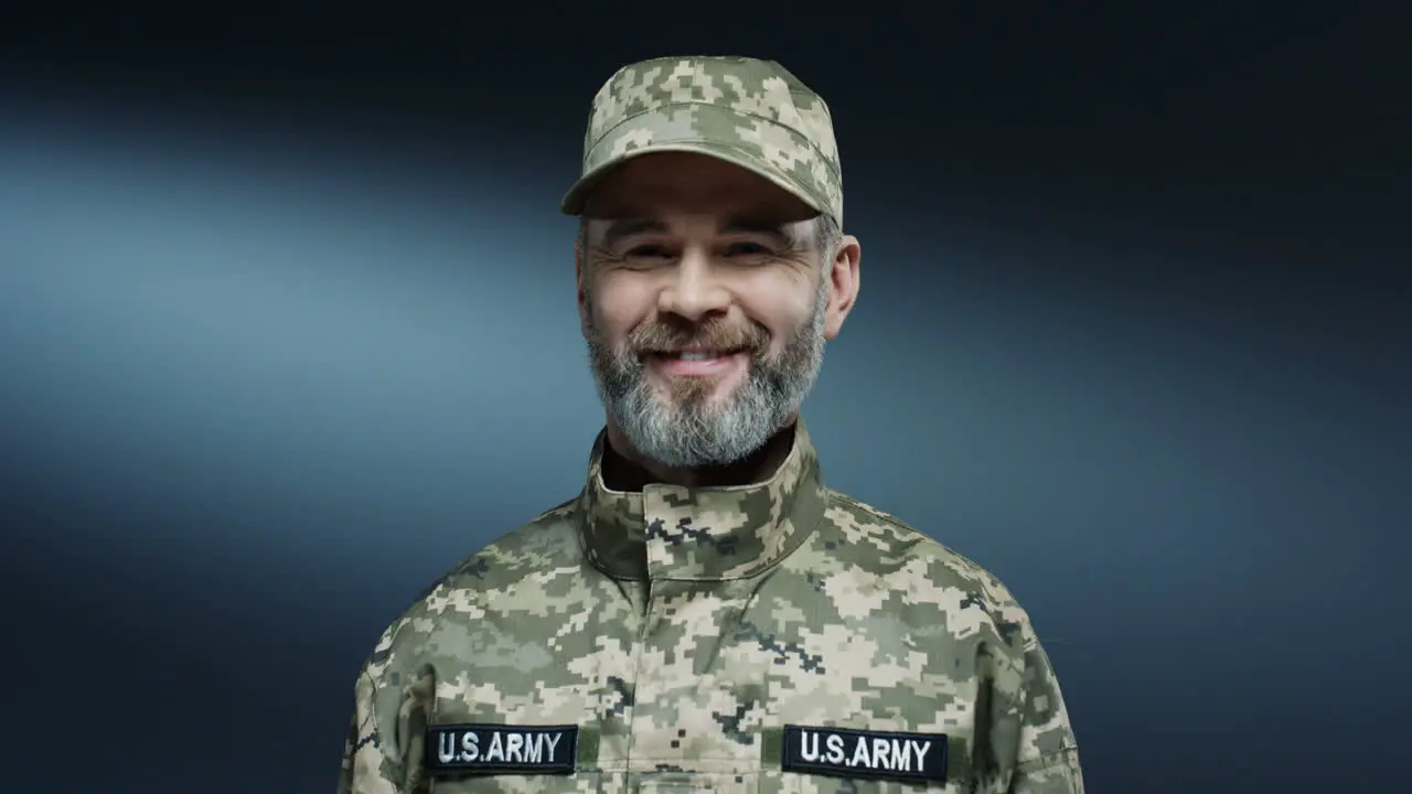 Portrait Shot Of The Handsome Strong And Brave Soldier Of Usa Forces Smiling Joyfully To The Camera