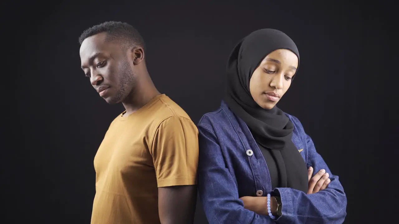 Portrait of stylish and attractive african muslim woman and man