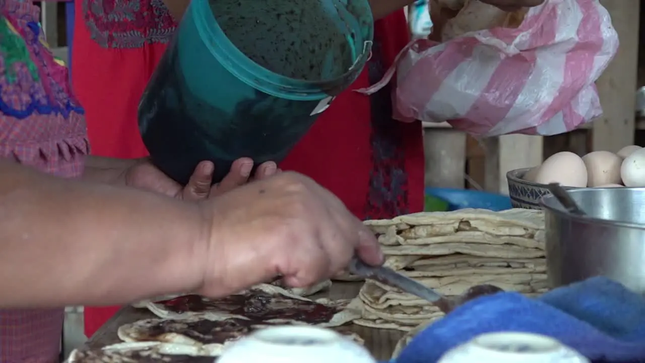 Women cooking mexican food from Oaxaca