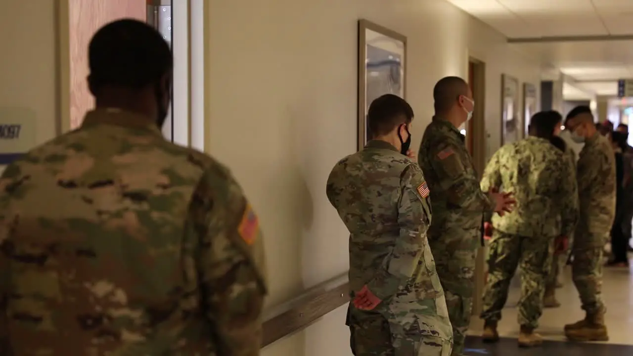 Us Army Soldiers Line Up For Vaccination And Innoculation With The Covid-19 Vaccine During The Global Pandemic