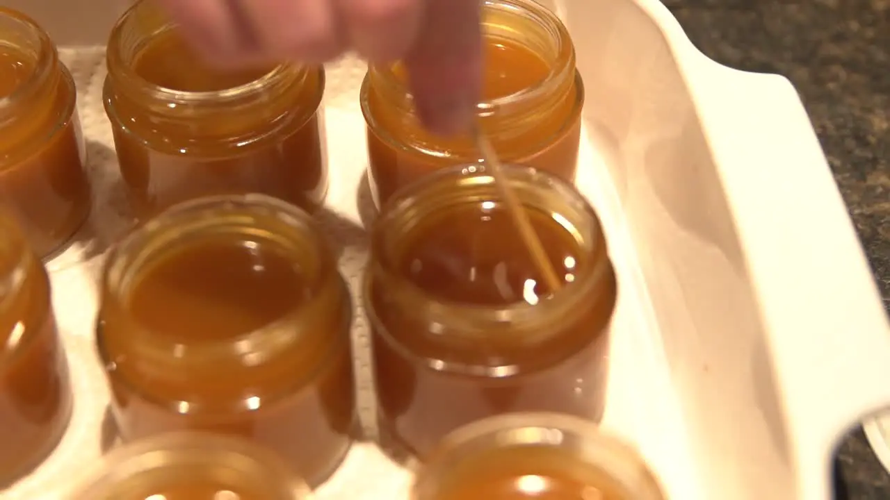 CBD and THC infused salve ointment cream being stirred