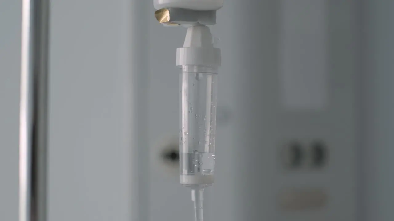 Handheld motion intravenous drip equipment Medical treatment concept Close up