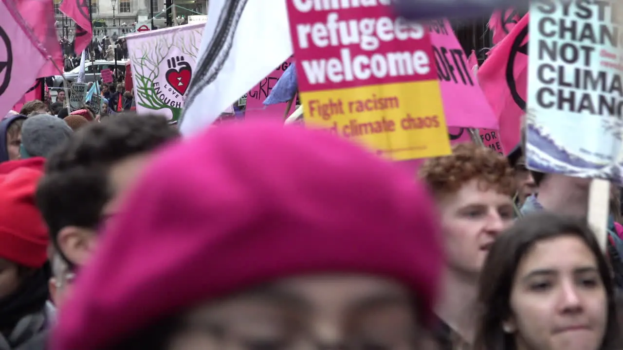 Hundreds of Extinction Rebellion climate crisis protestors carrying placards and banners march through the capital on the Enough is Enough” demonstration