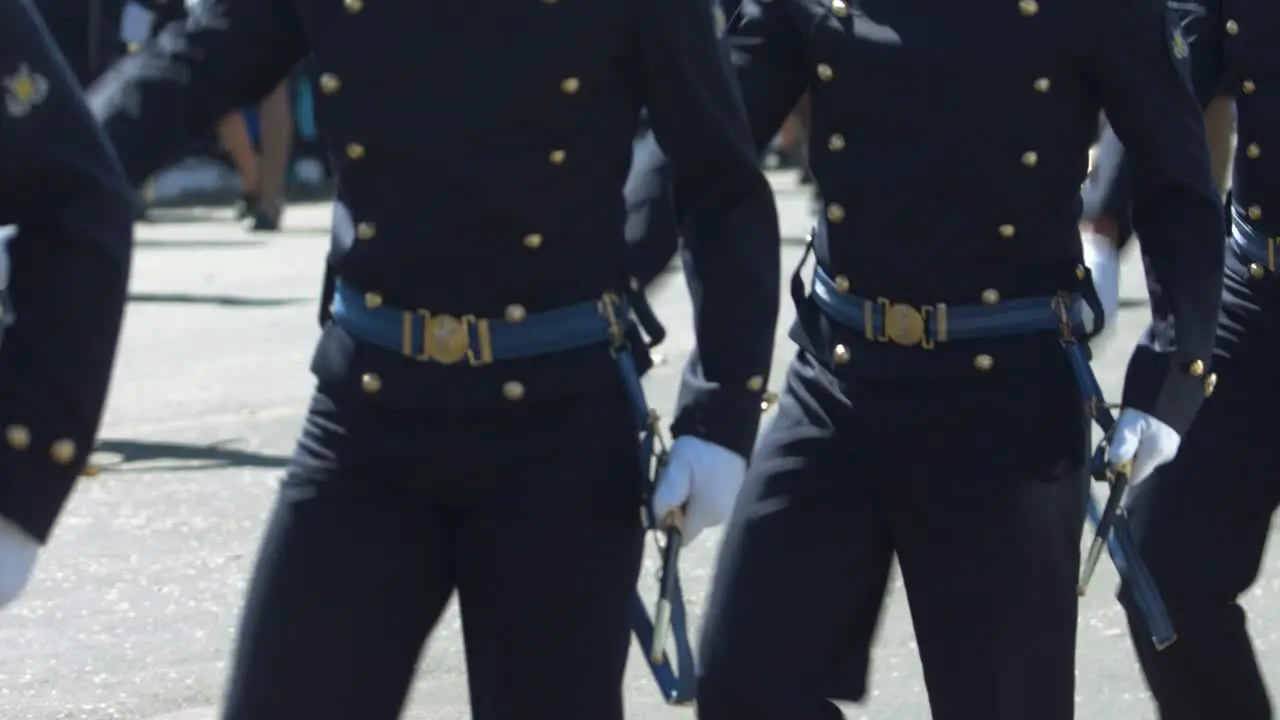 Brazilian soldiers dressed in formal attire march in a military parade