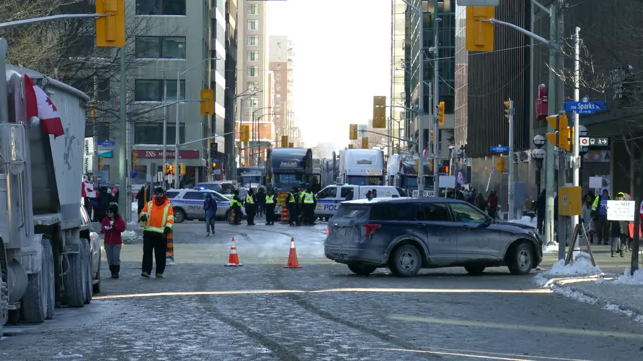 Police in Downtown Ottawa Block Convoy of Canadian Truckers Advancing Preventing Disruption to City Traffic