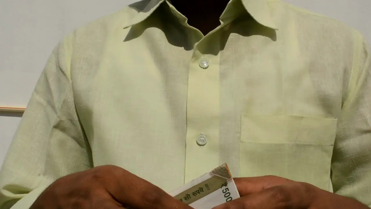 Man counting New Indian currency Notes