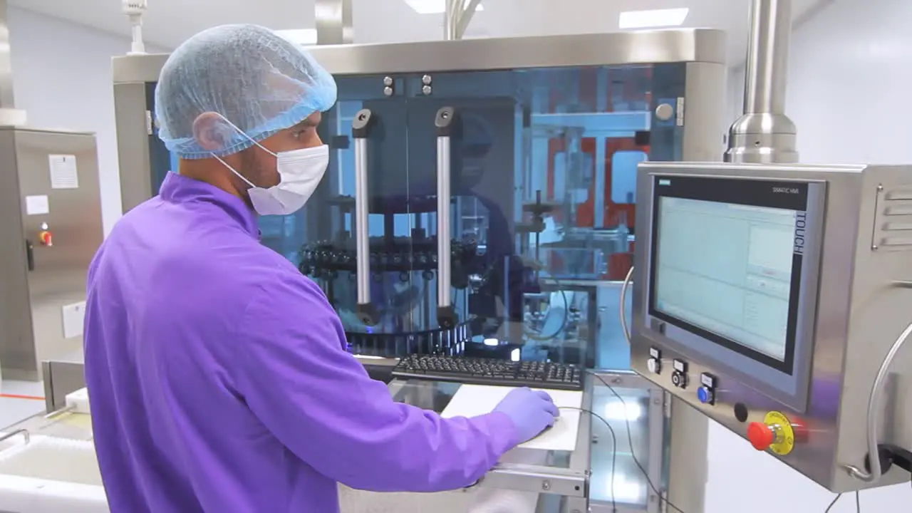 Control panel of automated production line at pharma factory