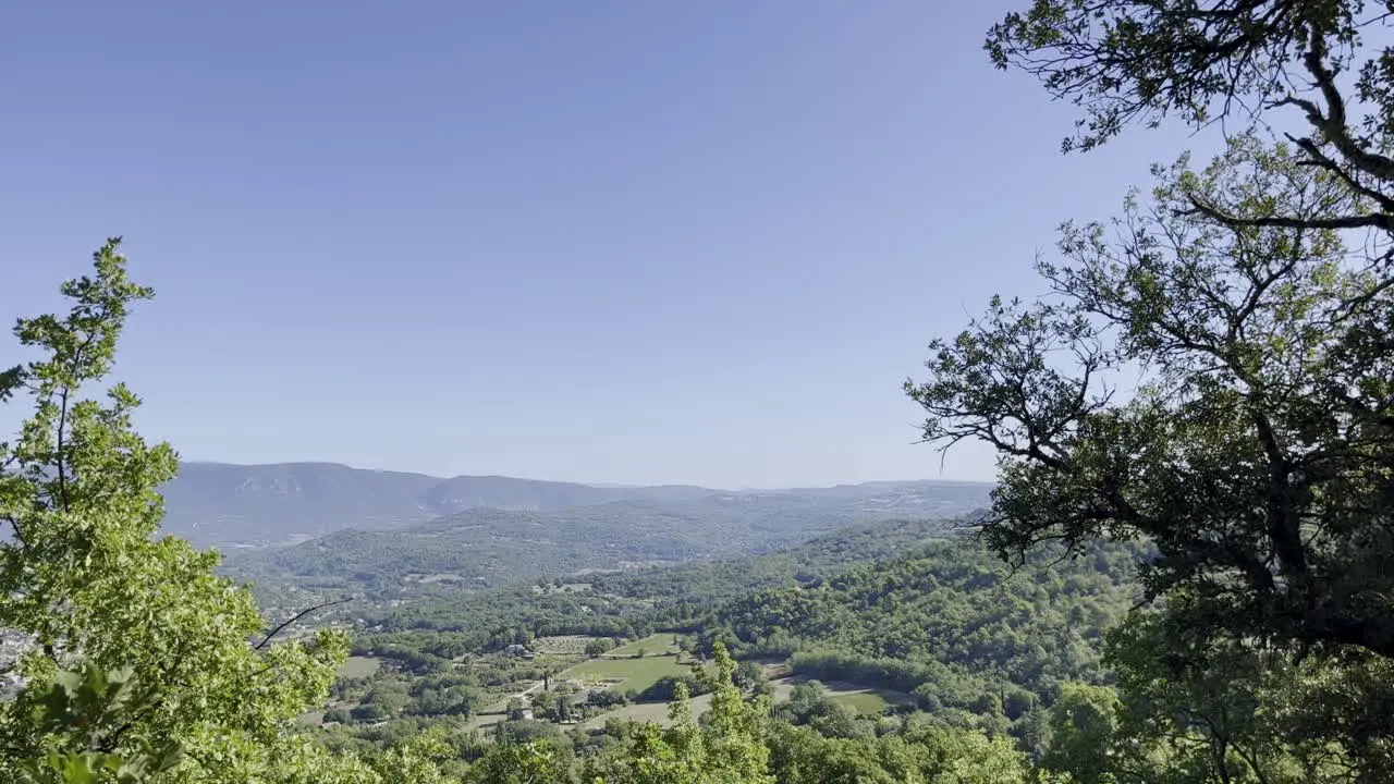 Further view of the landscape of France with forests and forests and green hills on the Hozizont in good weather and sun