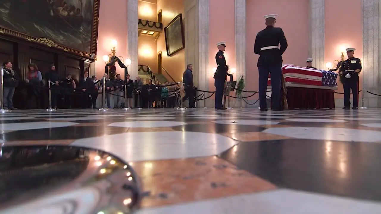 A Patriotic Flag Draped Coffin Sits At An Official State Military Funeral 1