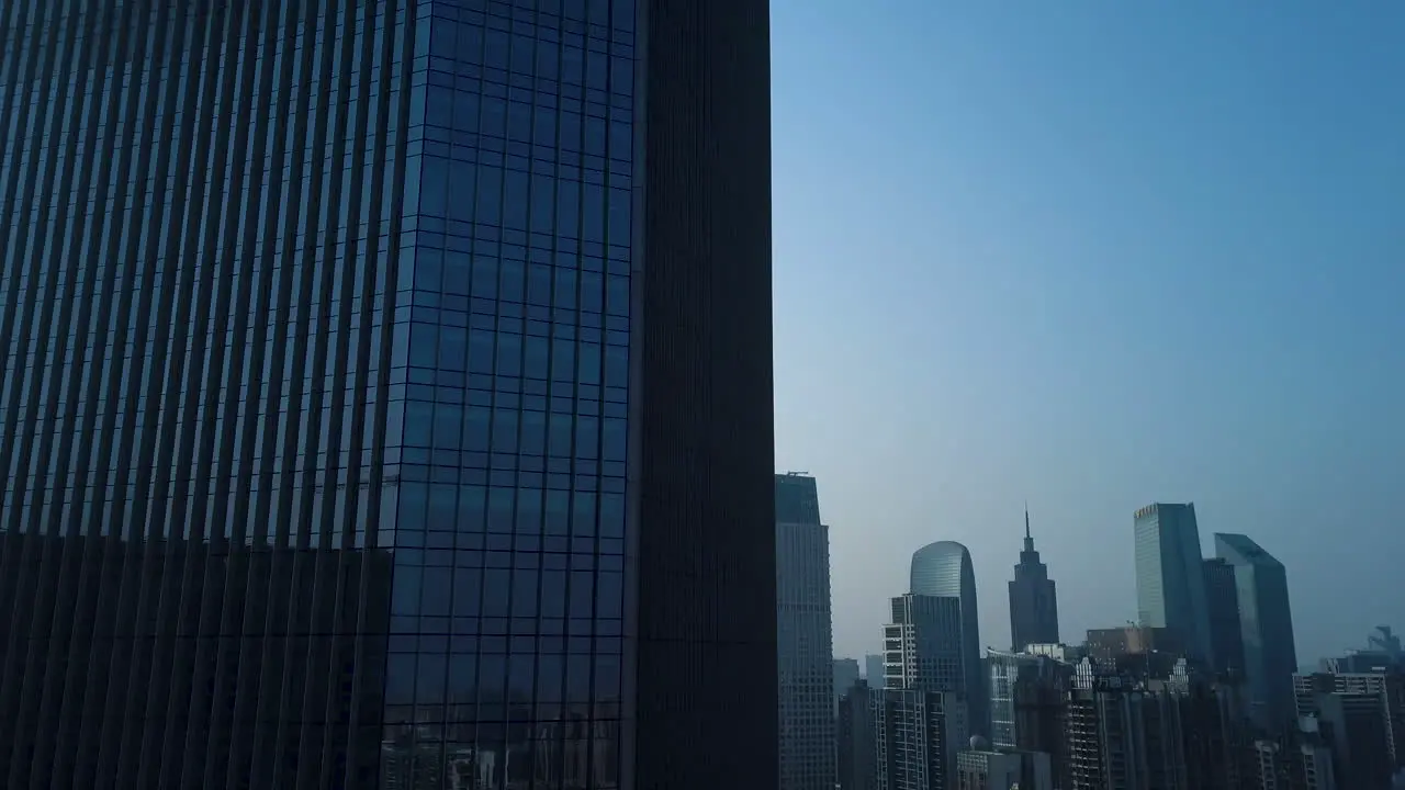 Aerial shot of mega city Guangzhou Central building district on a sunny day in the afternoon