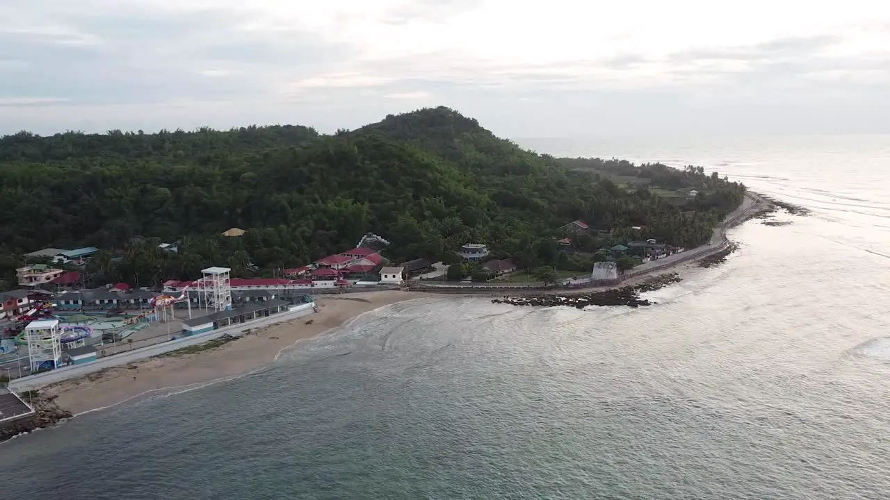 Aerial footage of an island with a swimming pool resort in the Philippines