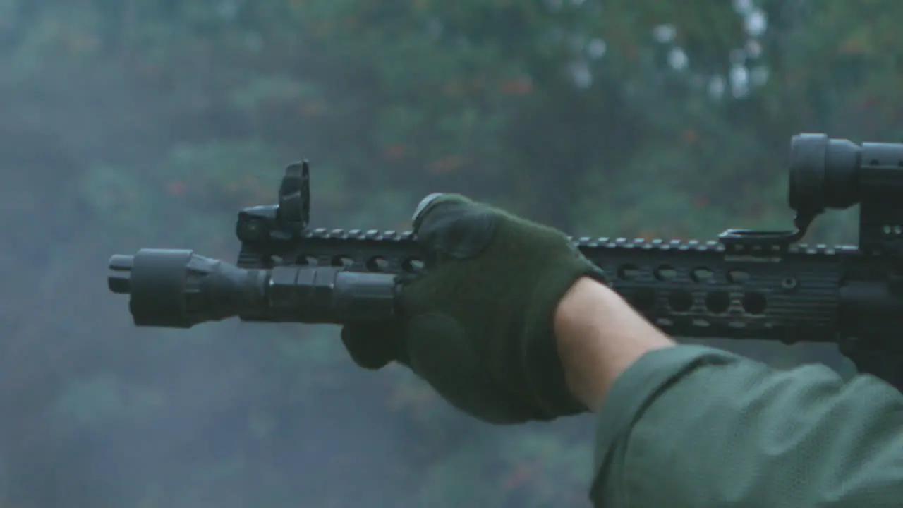 A police SWAT team office fires a rifle at a target range in super slow motion 1