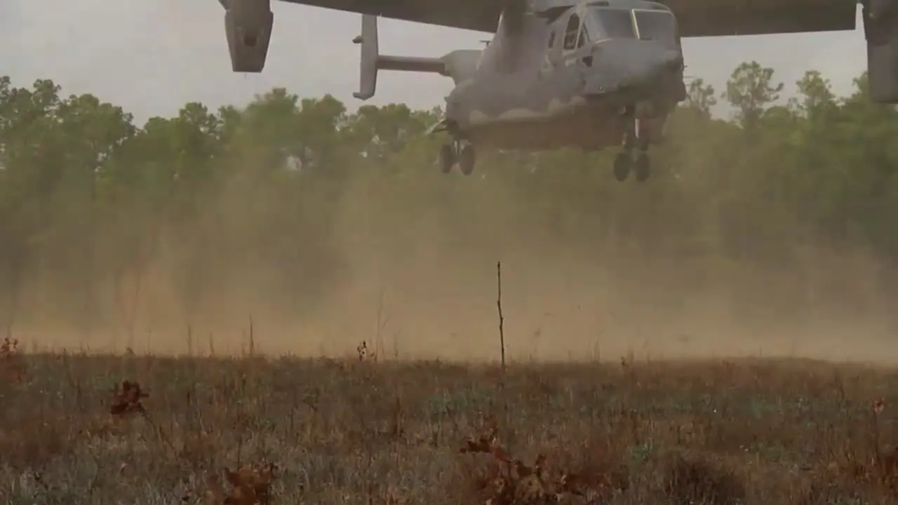 The Osprey Cv22 Helicopter Lands In A Field 1