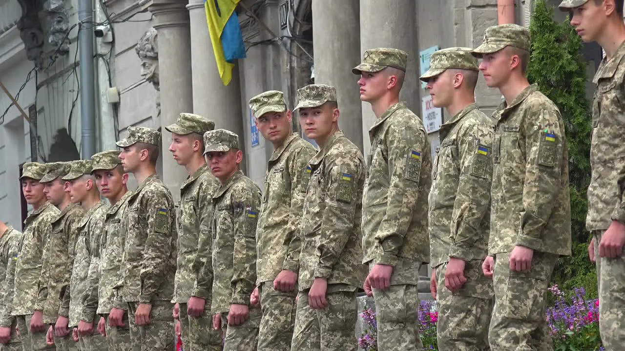 Ukrainian Army Soldiers Line A Street In Lviv Ukraine In Anticipation Of A Funeral For A Comrade