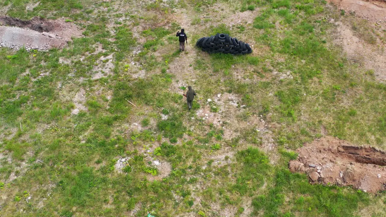 Flying above airsoft players return to base position after unsuccessful attack