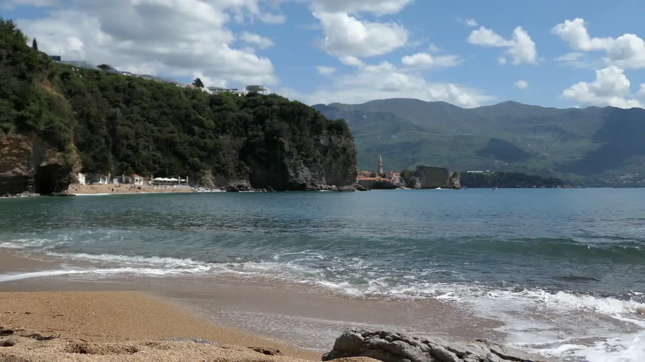 Tranquil beach with calm sea and gentle waves cinematic shot