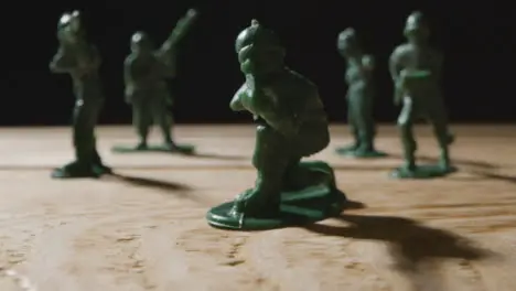 Tracking Shot Approaching a Handful of Toy Soldiers