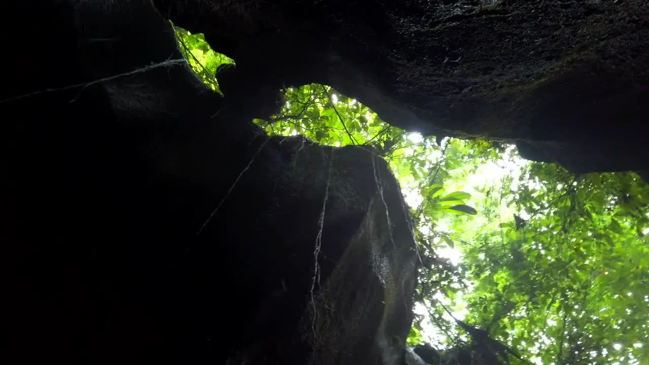 rotating view in a cave with a waterfall Ubud Bali Indonesia