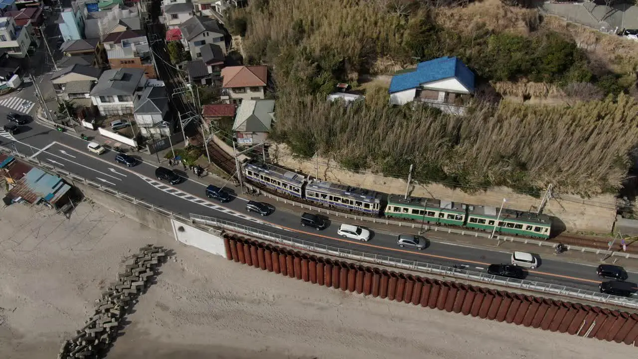 a train running by the sea