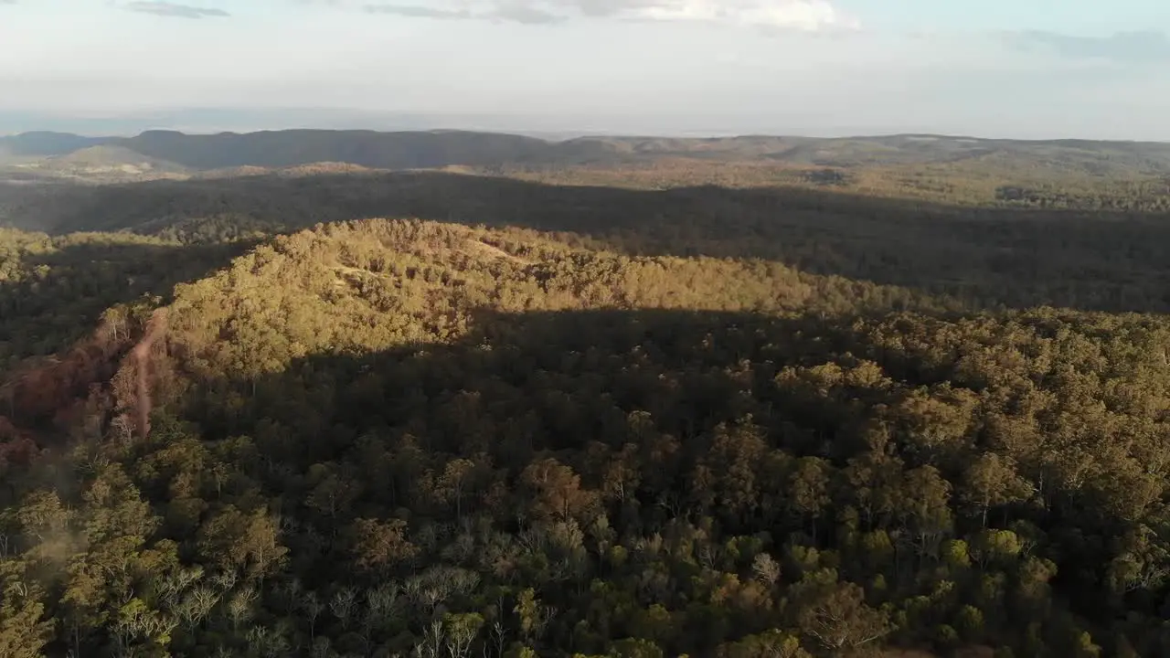 Drone flight over the Australian outback-bush at sunset