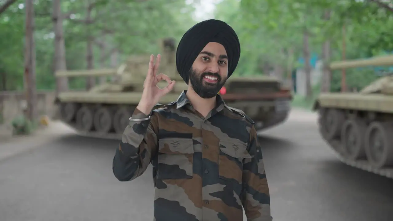 Happy Sikh Indian Army man showing okay sign