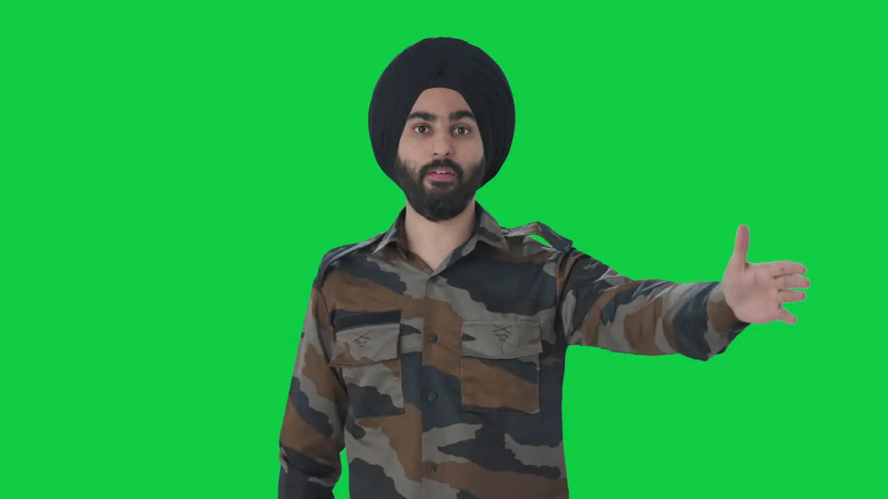 Angry Sikh Indian Army man shouting on someone Green screen