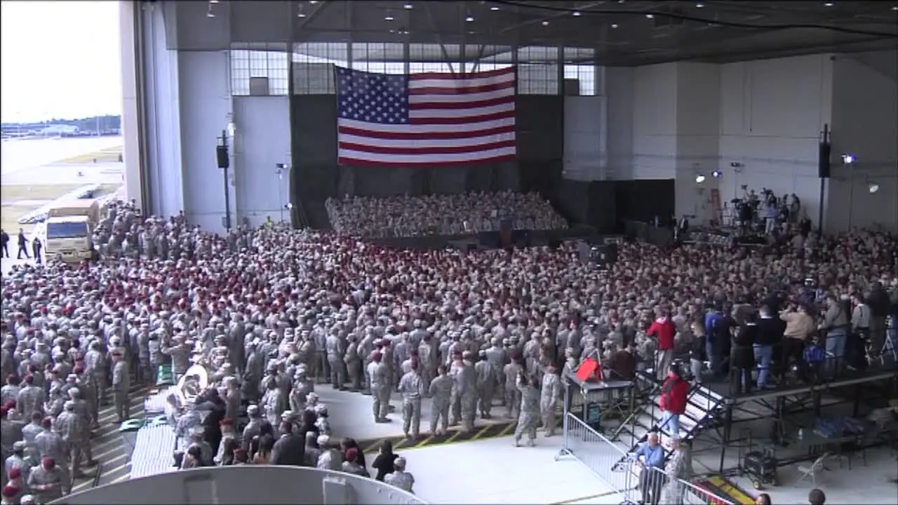 A Huge Crowd Of American Soldiers Waits To Greet President Obama Inside A Military Hangar At Ft Bragg Nc