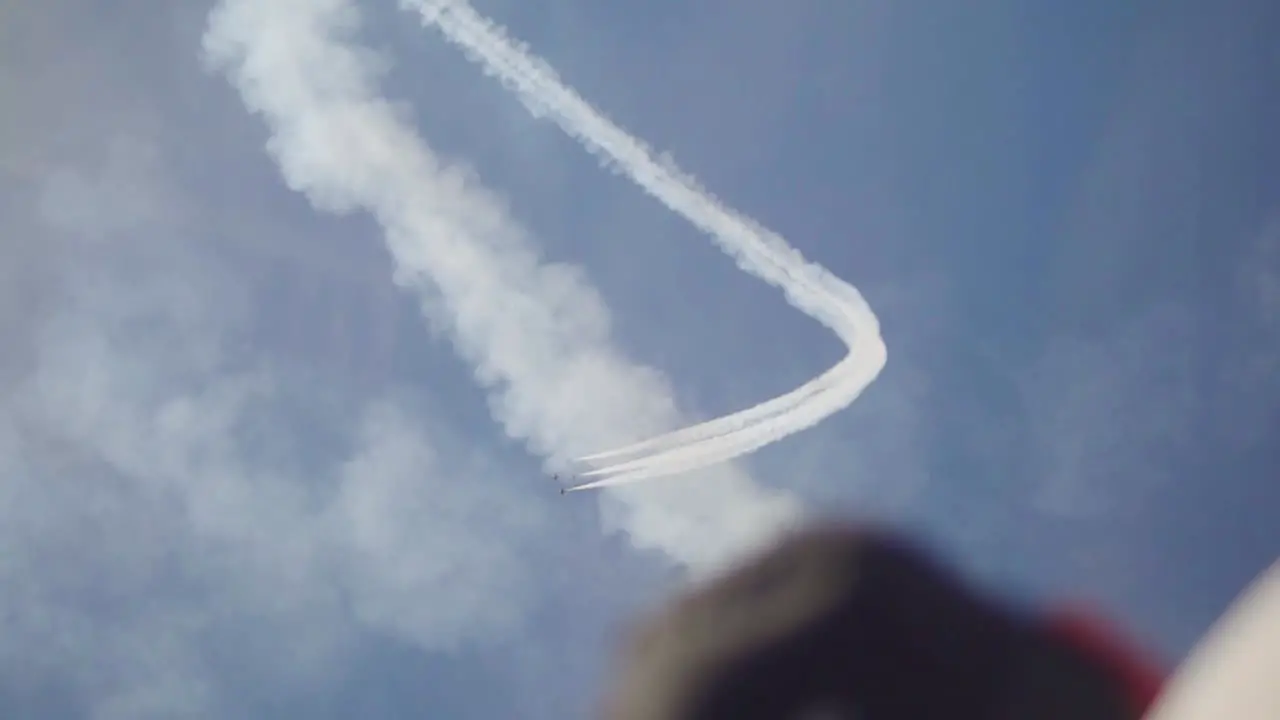 Man Looks Up at Stunt Jets in Slow-Motion