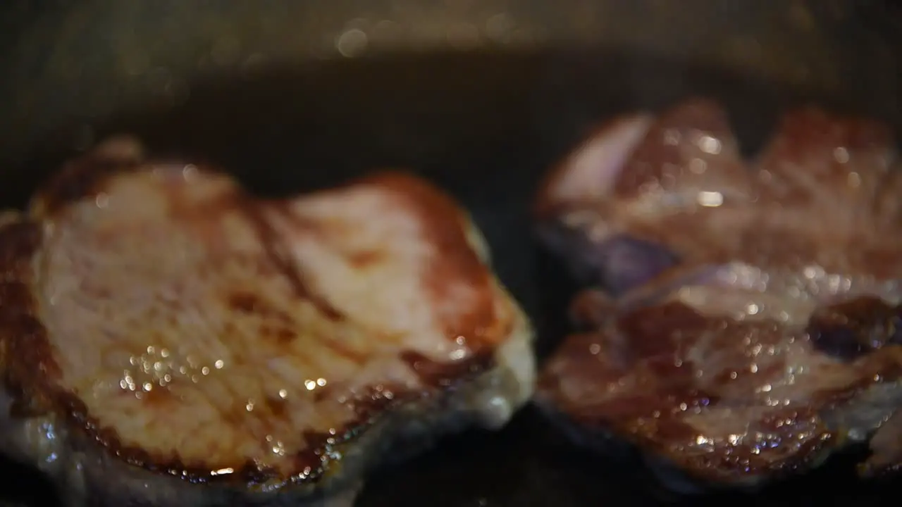 Cooked steaks in a frying pan