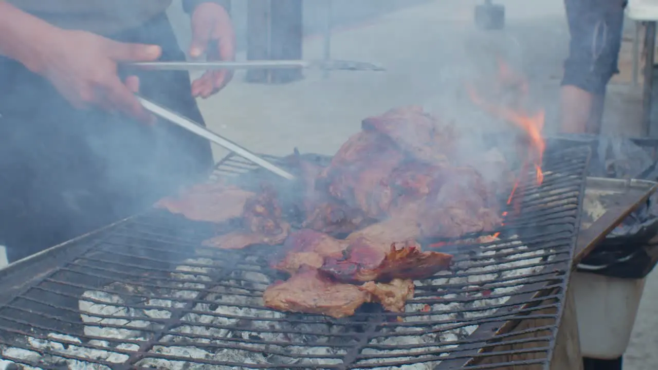 Outdoor Cooking cook sells meat