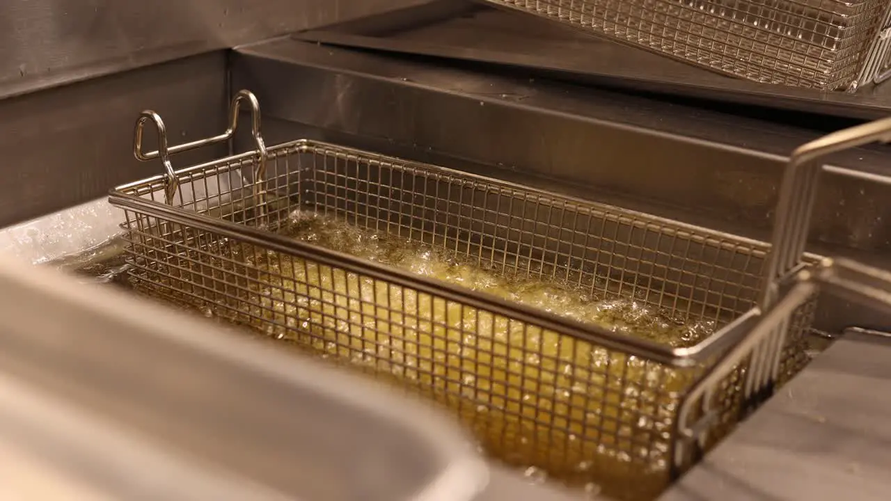 Deep Frying Food In Hot Bubbling Oil