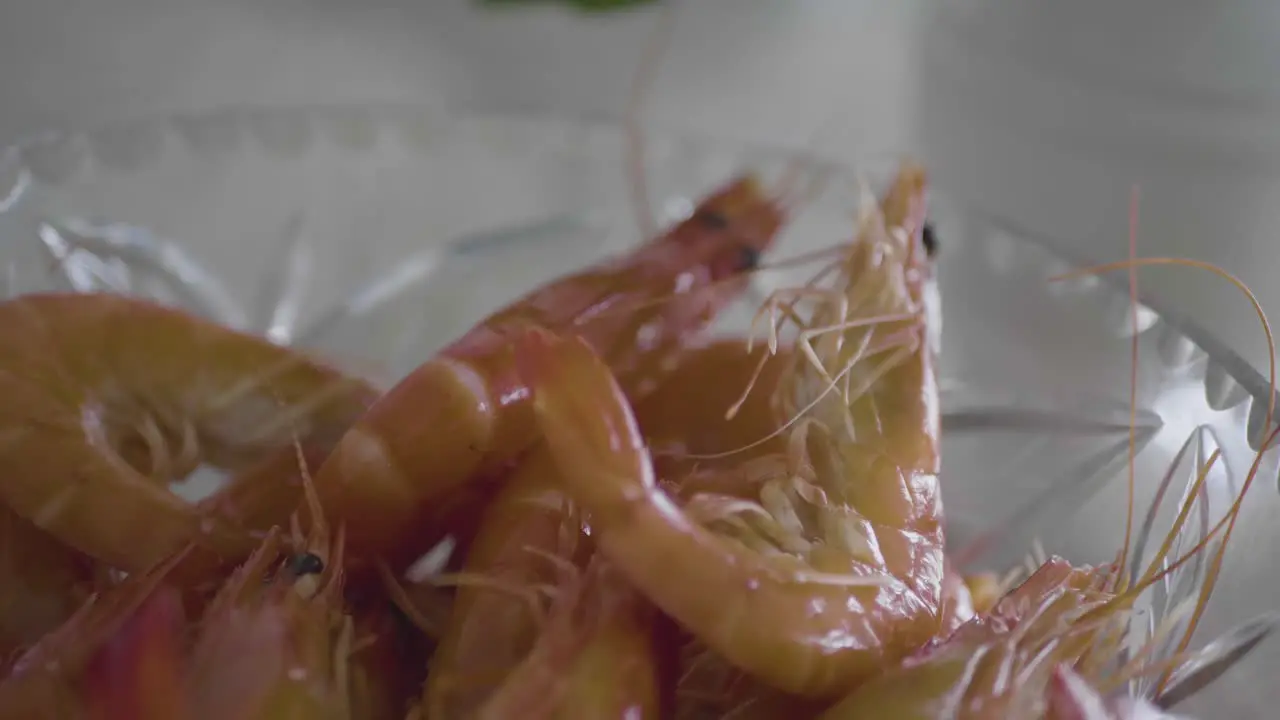 Closeup of fresh prawns in a bowl ready to be cooked in the kitchen