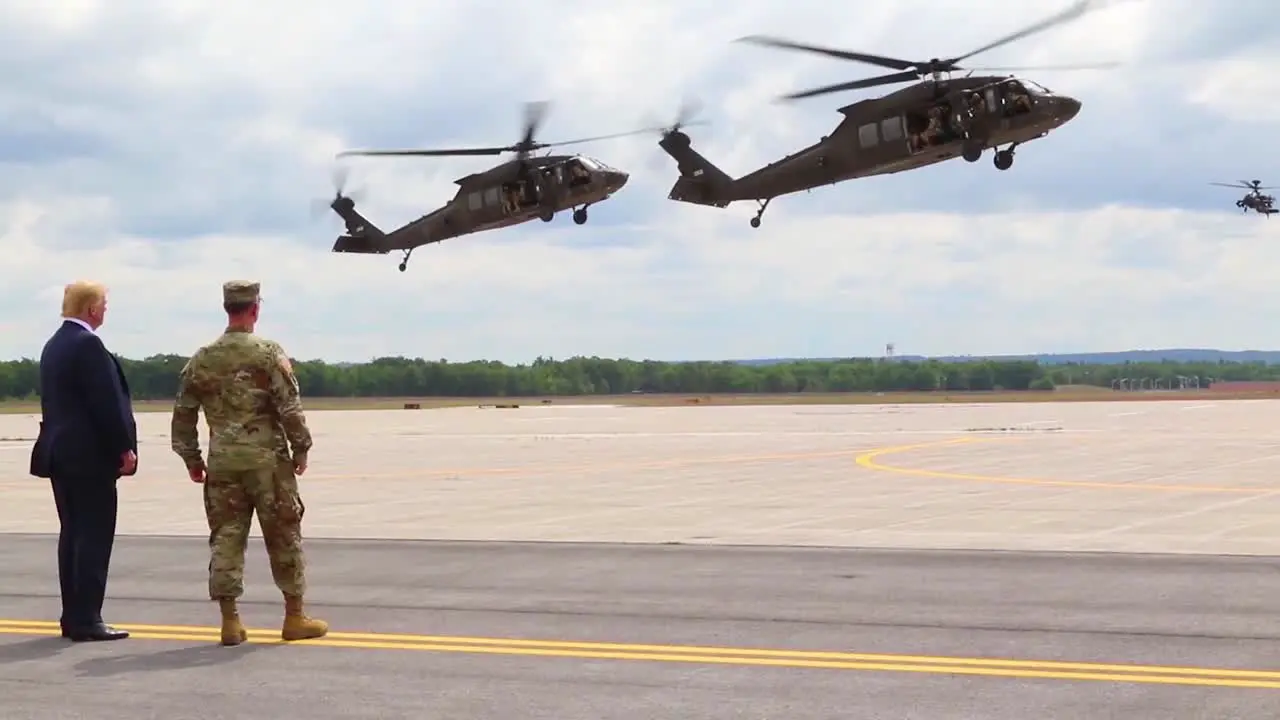 Us President Donald J Trump Greets Commanders And Watches An Aerial Display During His Visit To Fort Drum Ny To Sign The 2019 National Defense Authorization Act 1