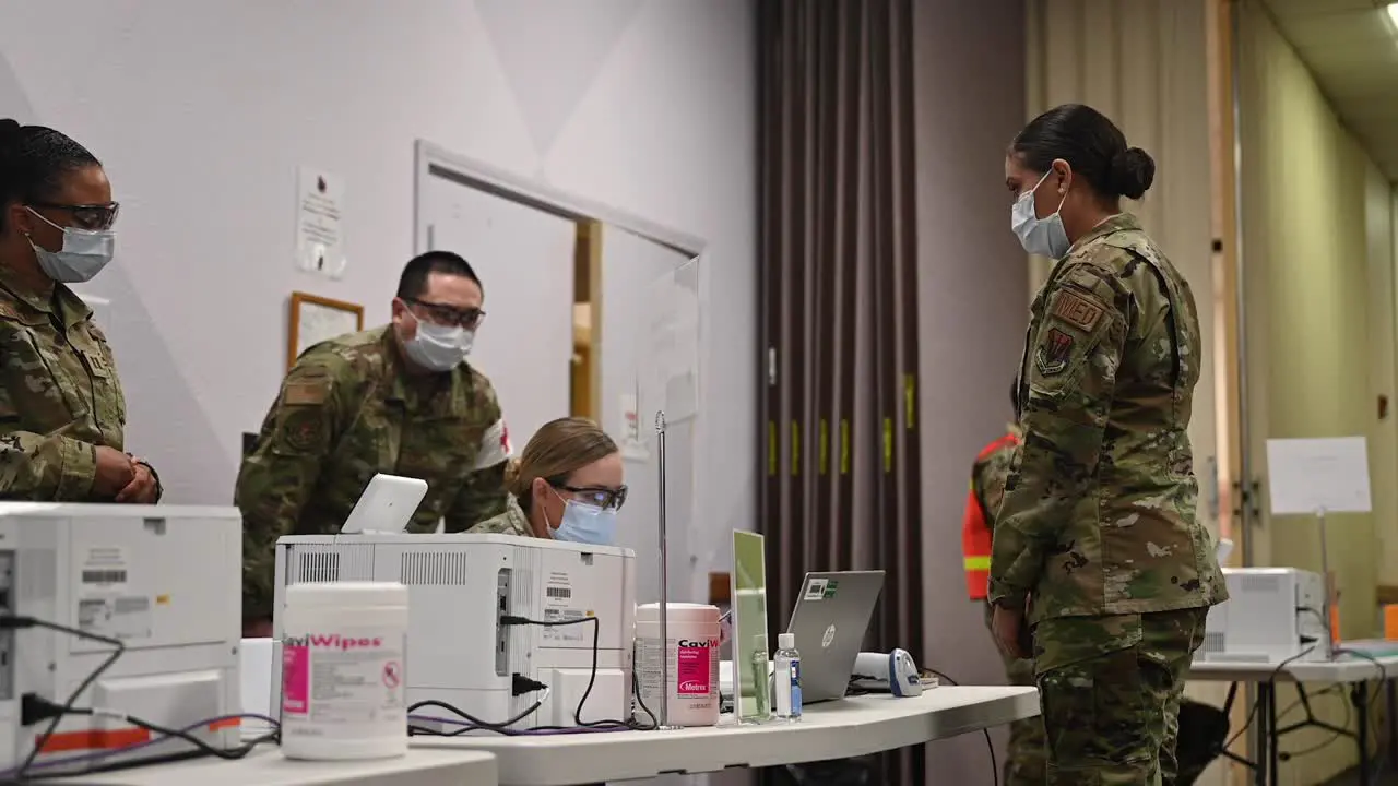 The Enoculation Process For The First Recipient Of The Covid-19 Pandemic Vaccine At Nellis Air Force Base Nevada