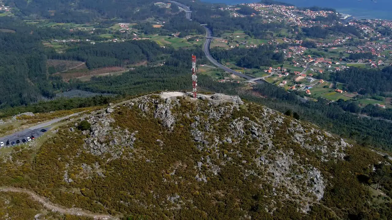 Aerial View Of Telecommunications Mast On Rocky Hillside In Miradoiro da Curota