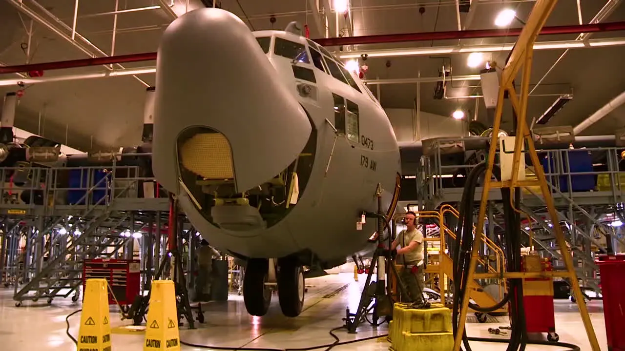 Time Lapse Of C130 Hercules Military Airplane In A Hangar For Maintenance 1