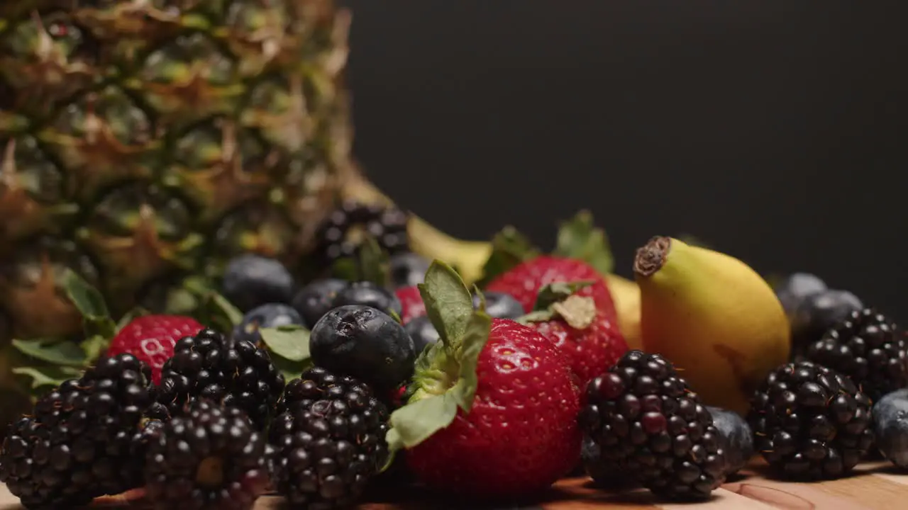 Fruits spinning on a cutting board